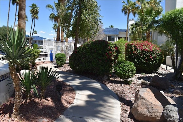 view of property's community with fence