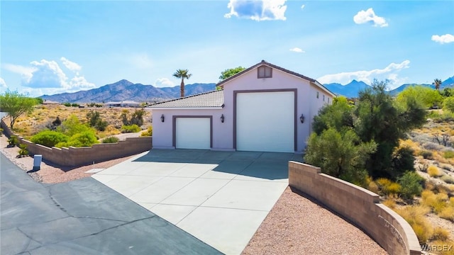 garage featuring a mountain view