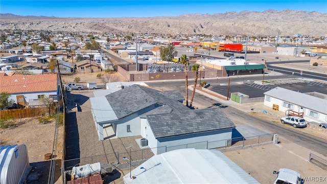 birds eye view of property with a residential view and a mountain view