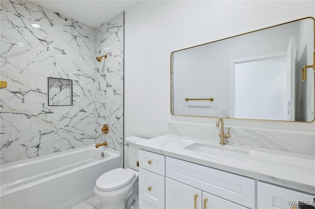 bathroom with marble finish floor, vanity, toilet, and bathing tub / shower combination