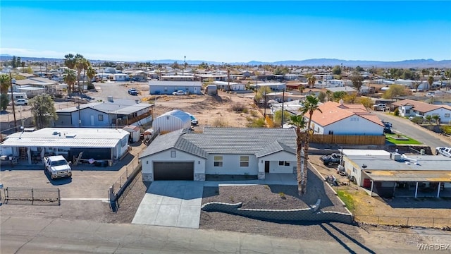 aerial view featuring a residential view and a mountain view