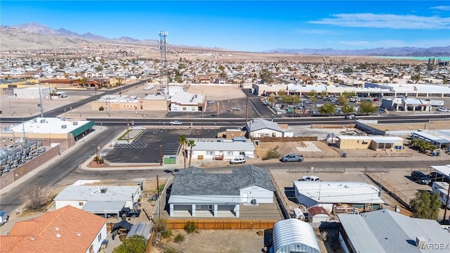 birds eye view of property with a residential view and a mountain view