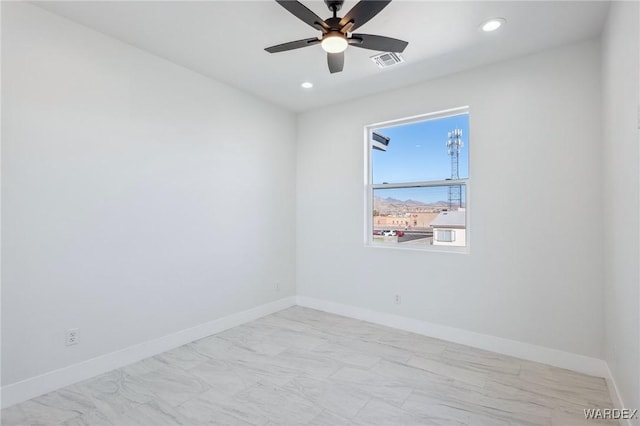 empty room with visible vents, baseboards, a ceiling fan, and recessed lighting