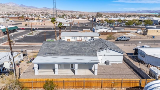 birds eye view of property with a residential view and a mountain view