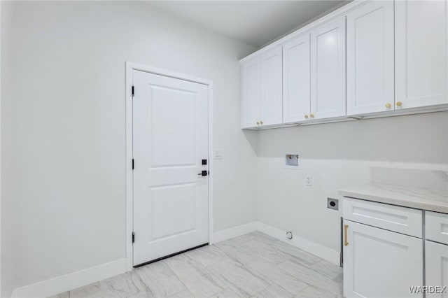 laundry room with cabinet space, baseboards, marble finish floor, hookup for an electric dryer, and washer hookup