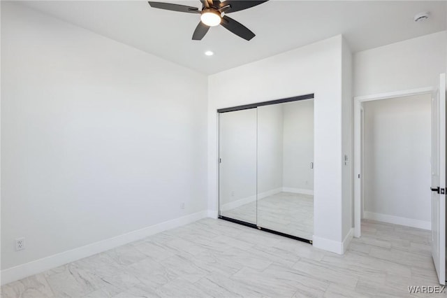 unfurnished bedroom featuring a ceiling fan, baseboards, a closet, and recessed lighting