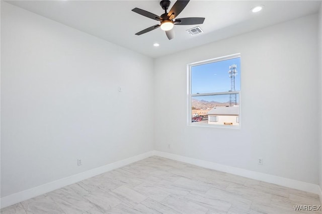 unfurnished room with recessed lighting, visible vents, and baseboards