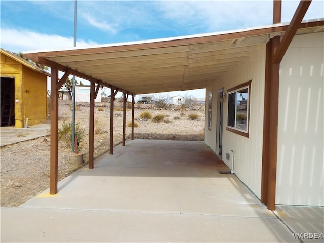 17516 N Ladera Dr, Dolan Springs, AZ 86441 - view of patio featuring an attached carport