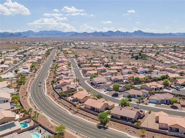 drone / aerial view with a residential view and a mountain view