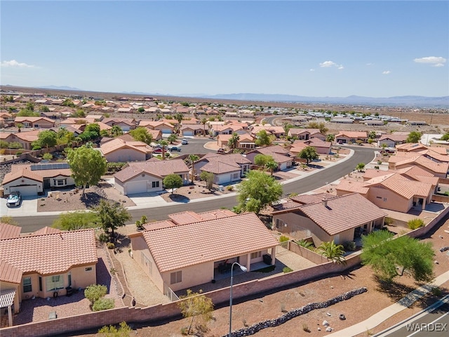 birds eye view of property with a residential view