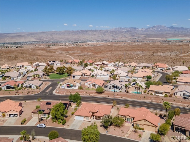 bird's eye view with a residential view and a mountain view