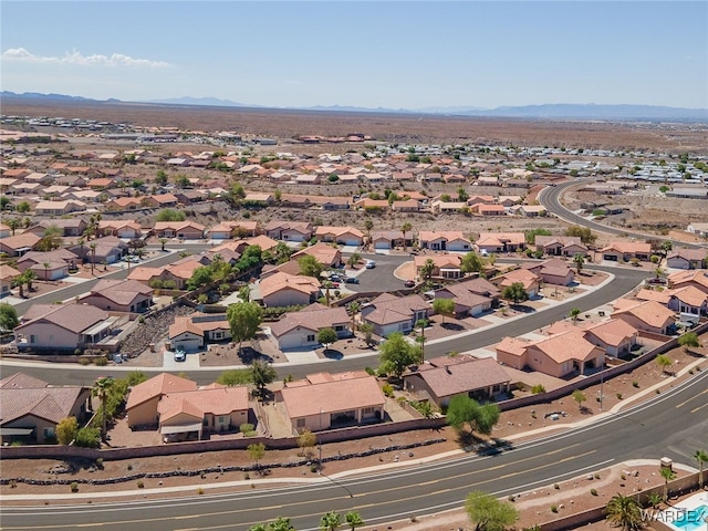 aerial view with a mountain view and a residential view