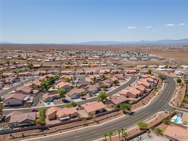 birds eye view of property with a residential view and a mountain view