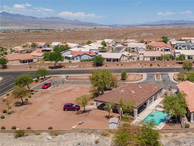 birds eye view of property featuring a residential view and a mountain view