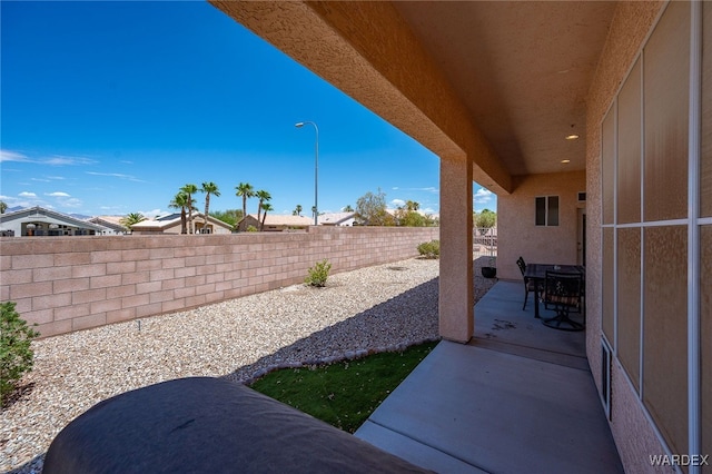 view of patio featuring a fenced backyard