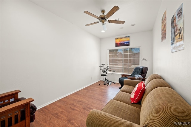 sitting room with baseboards, ceiling fan, recessed lighting, and light wood-style floors