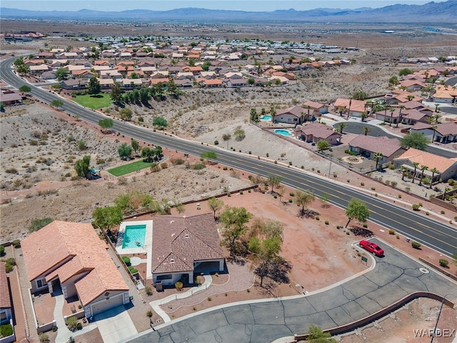 birds eye view of property featuring a residential view and a mountain view