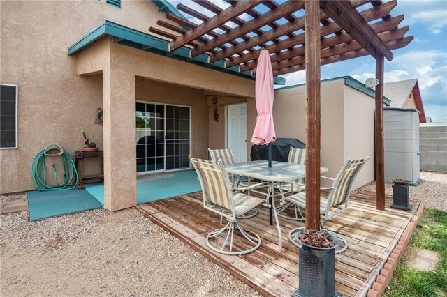 4875 N Famoso Dr, Kingman, AZ 86409 - view of patio / terrace with a deck, a pergola, outdoor dining area, and fence