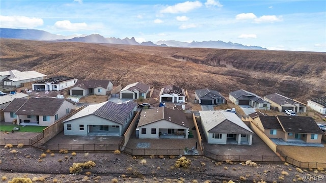 birds eye view of property featuring a residential view and a mountain view