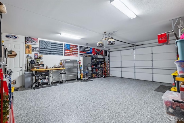 garage featuring a garage door opener