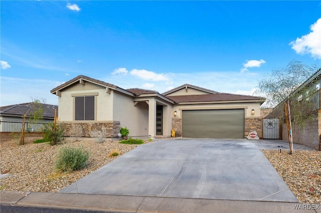 single story home featuring stone siding, an attached garage, driveway, and stucco siding