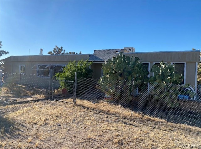 view of front of house with fence