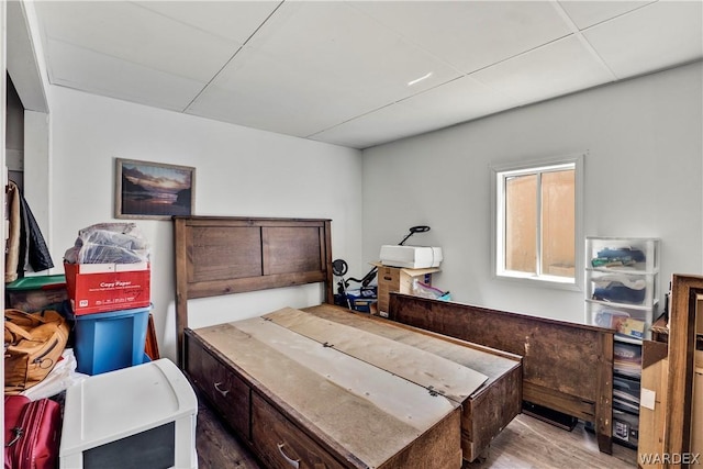 bedroom with wood finished floors