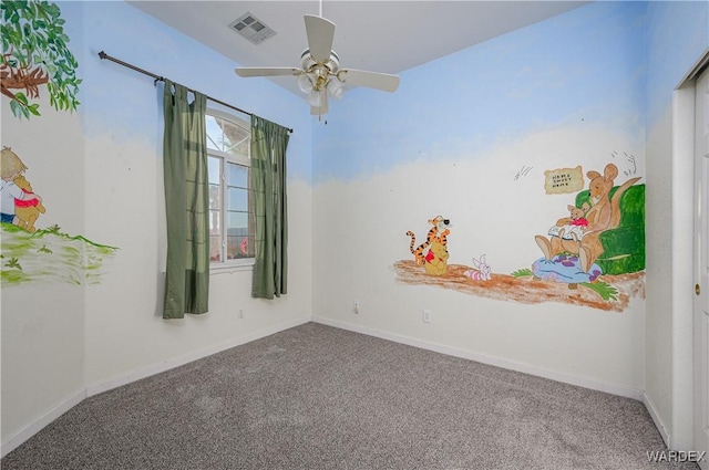 unfurnished room with baseboards, visible vents, and carpet flooring