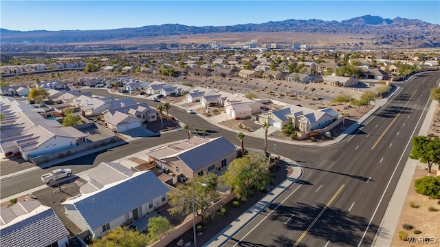 birds eye view of property with a residential view and a mountain view