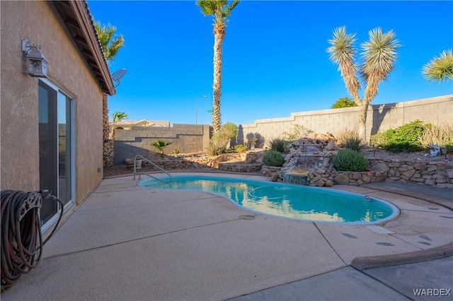 view of pool featuring a patio area, a fenced backyard, and a fenced in pool