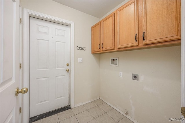 washroom with light tile patterned floors, hookup for a washing machine, cabinet space, hookup for an electric dryer, and baseboards