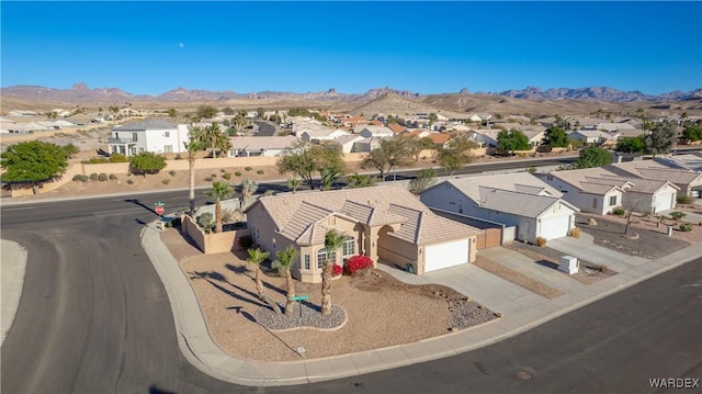 aerial view with a residential view and a mountain view