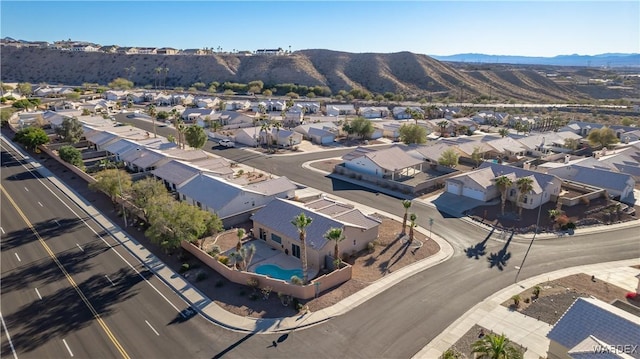 drone / aerial view with a residential view and a mountain view