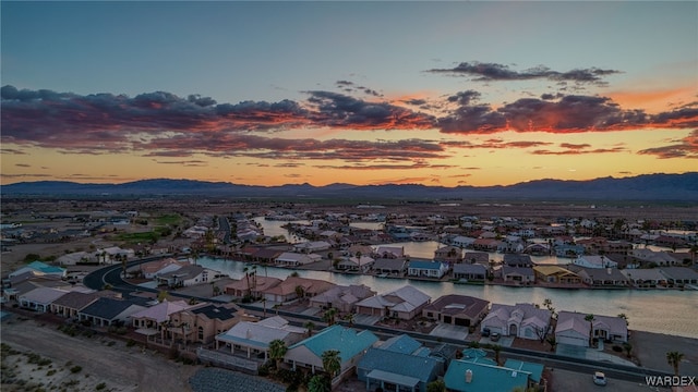 drone / aerial view with a mountain view and a residential view