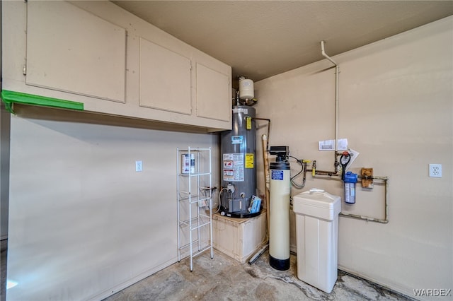 utility room featuring gas water heater