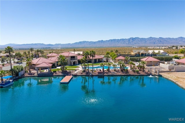 view of swimming pool with a mountain view and a residential view