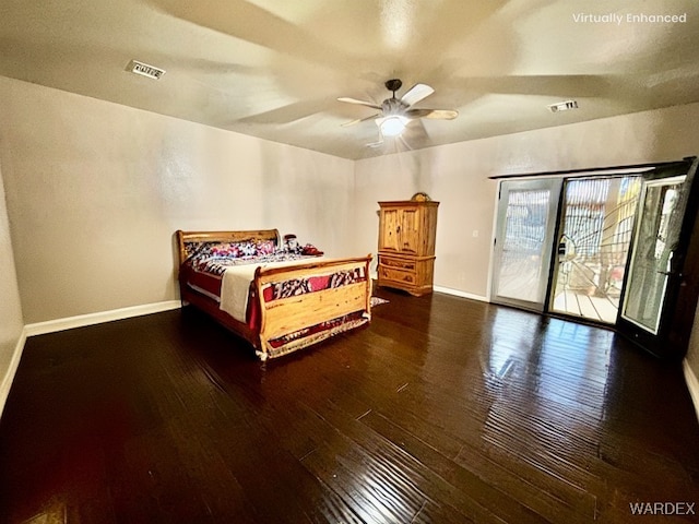 bedroom with access to exterior, hardwood / wood-style flooring, baseboards, and visible vents