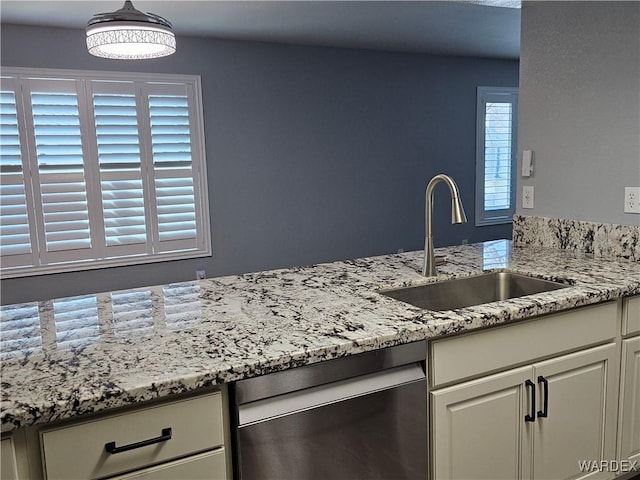 1800 Clubhouse Dr Unit 89, Bullhead City, AZ 86442 - kitchen featuring a sink, stainless steel dishwasher, white cabinetry, and light stone counters