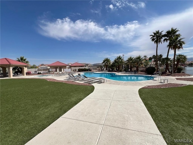6052 S Bella Vista Dr, Fort Mohave, AZ 86426 - community pool featuring a patio, a gazebo, and a yard