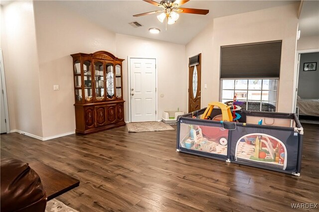 6052 S Bella Vista Dr, Fort Mohave, AZ 86426 - interior space with ceiling fan, baseboards, wood finished floors, vaulted ceiling, and visible vents