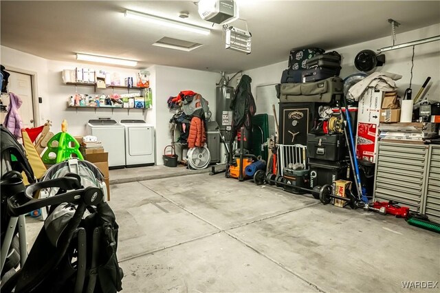 6052 S Bella Vista Dr, Fort Mohave, AZ 86426 - garage featuring a garage door opener and washing machine and dryer