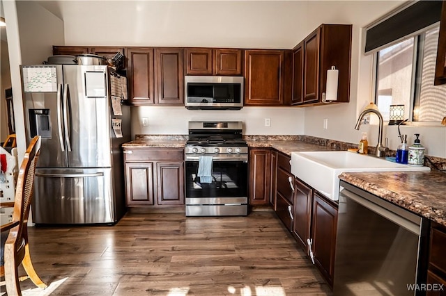 6052 S Bella Vista Dr, Fort Mohave, AZ 86426 - kitchen featuring a sink, dark brown cabinets, stainless steel appliances, and dark wood-type flooring