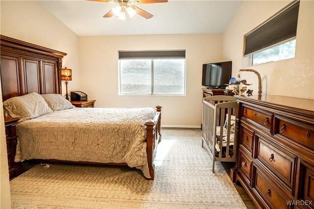 6052 S Bella Vista Dr, Fort Mohave, AZ 86426 - bedroom with baseboards and a ceiling fan