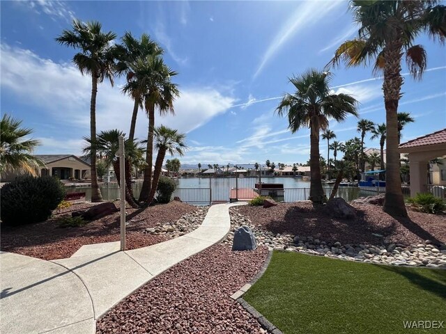 6052 S Bella Vista Dr, Fort Mohave, AZ 86426 - view of yard with fence and a water view