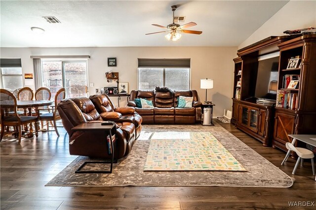 6052 S Bella Vista Dr, Fort Mohave, AZ 86426 - living room with visible vents, ceiling fan, and wood finished floors