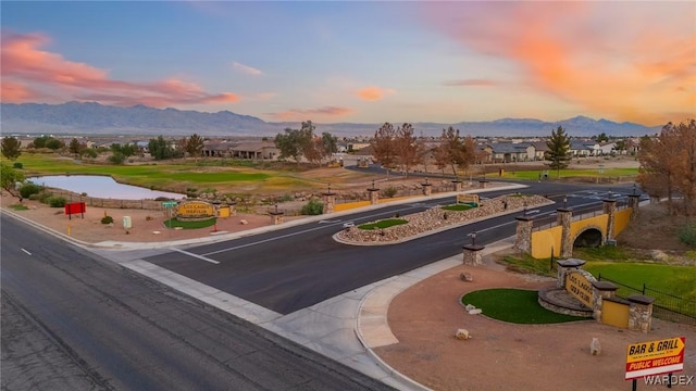 view of property's community with a water and mountain view