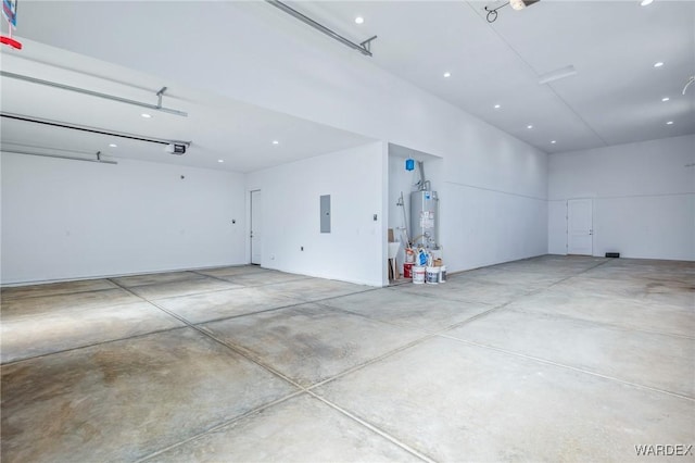 2353 E Calle Toledo, Fort Mohave, AZ 86426 - garage featuring electric panel, gas water heater, and a garage door opener