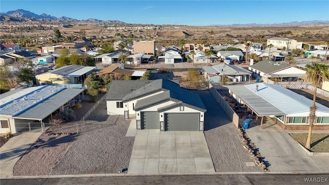 bird's eye view featuring a residential view and a mountain view