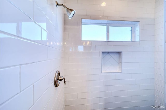 full bathroom with tiled shower