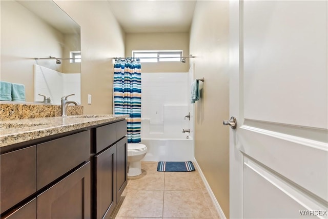 full bathroom with tile patterned flooring, baseboards, toilet, shower / bath combo, and vanity